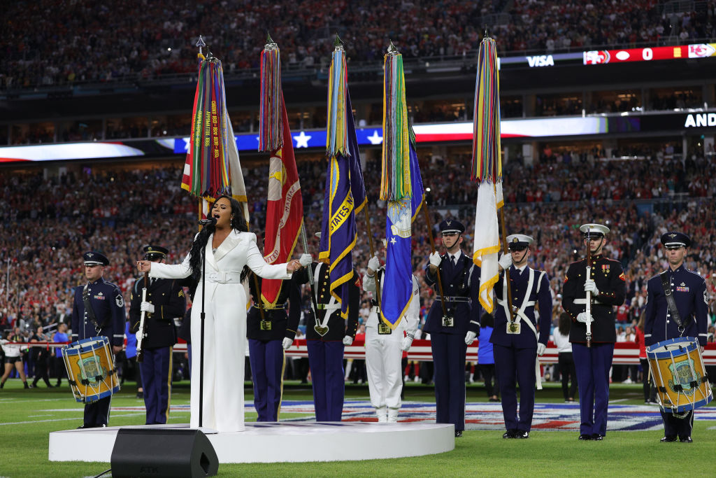 MIAMI, FLORIDA - FEBRUARY 02: Singer Demi Lovato performs the national anthem prior to Super Bowl LIV between the San Francisco 49ers and the Kansas City Chiefs at Hard Rock Stadium on February 02, 2020 in Miami, Florida. (Photo by Tom Pennington/Getty Images)